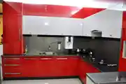 Contemporary L-Shaped Kitchen Design With Red And White Cabinets