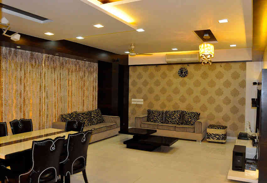 Modern Beige And Magenta Living Room Design With Wooden TV Unit