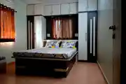 Modern Bedroom Design With Dark Wood Swing Wardrobe