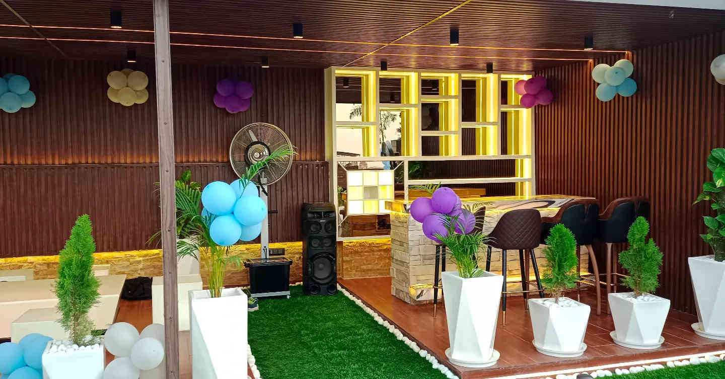 Elegant Outdoor Lounge with Modern Bar & Decor
