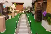 Luxurious Rooftop Garden with Illuminated Pathway