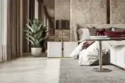 Elegant Bedroom Corner with Greenery and Sophisticated Decor Elements