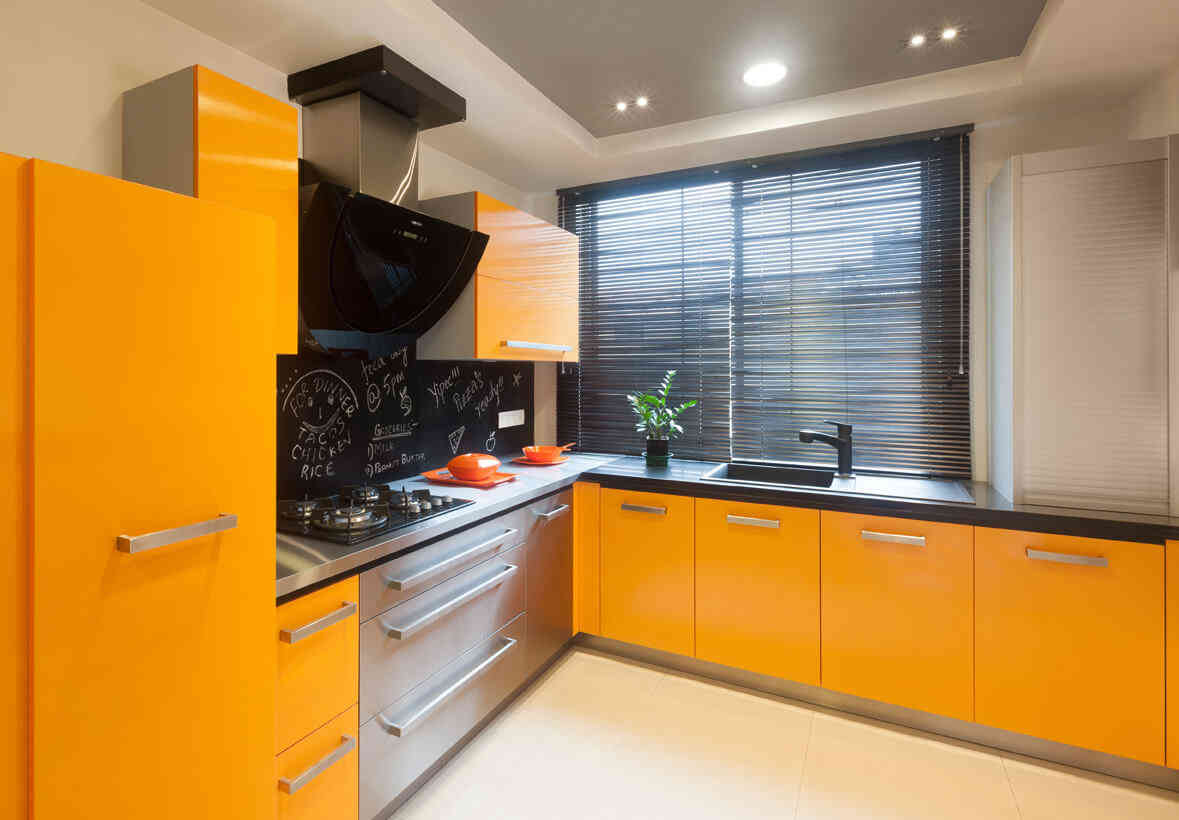 Modern Modular L-Shaped Kitchen With Bright Yellow Colour Cabinets