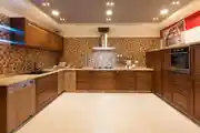 Modern U-Shaped Kitchen Design With 3D Textured Tiles