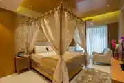 Master Modern Bedroom Design With Canopy Bed And Side Table