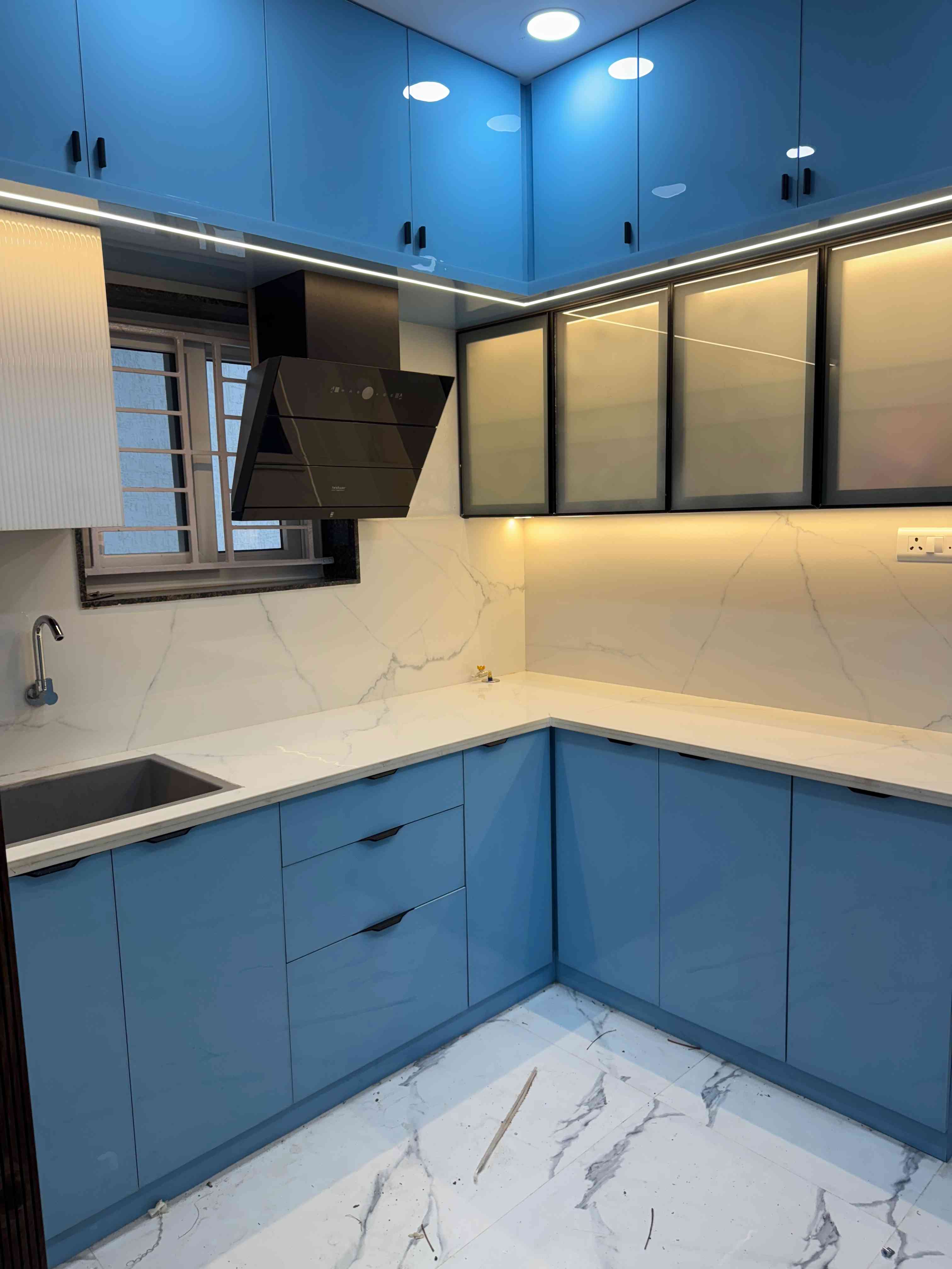 Modern Blue Island Kitchen Design with Marble Countertops