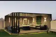 A Chic And Cozy Outdoor Lounge With Modern Lighting