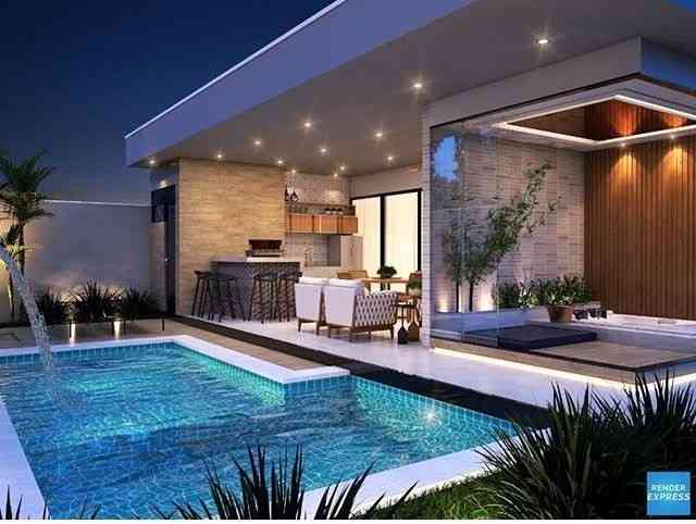 A Sleek And Luxurious Modern Villa With An Inviting Poolside Oasis