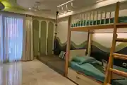 Stylish Kids Room with Bunk Bed, Playful Swing, and Nature-Inspired Design
