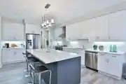 Modern Light Blue And Wooden Parallel Modular Kitchen Design With Dining Table