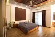 Modern Master Bedroom Design With Glossy Wardrobe