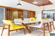 Contemporary Dining Room Setup With Sleek Marble-Top Table 
