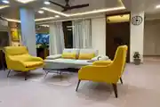 Modern Living Room With Furniture And Ceiling Lights