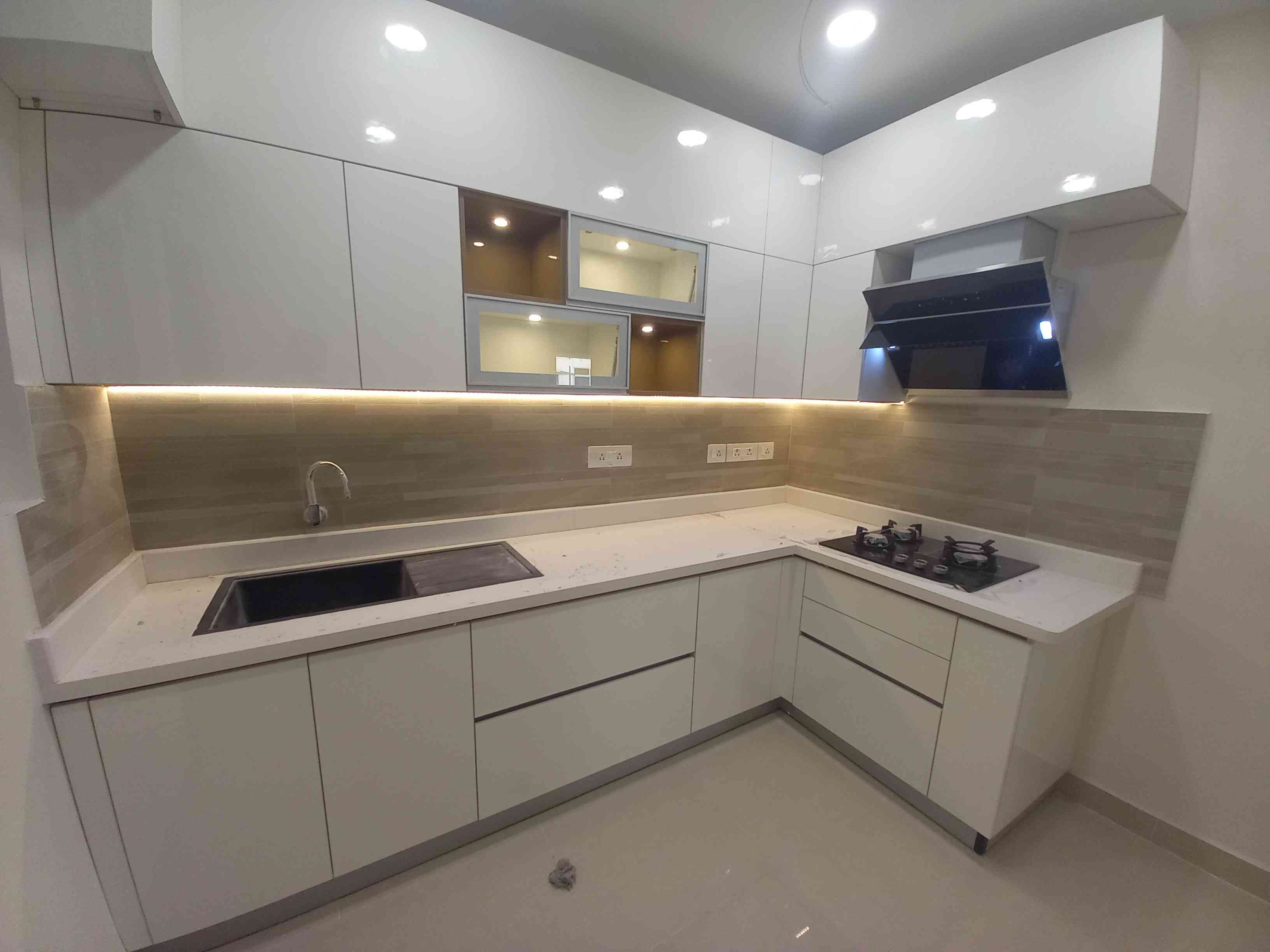 Modern L-Shape Modular Kitchen Design with Dark Grey Base and Tall Units