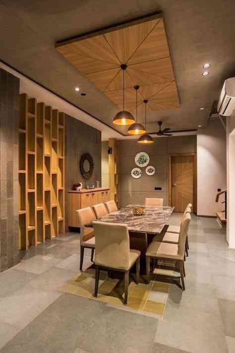 Modern 8-Seater Dining Room Design With Drop Lights