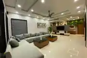 Modern Style Spacious Living Room Design With L-Shaped Sofa