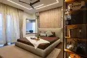 Luxurious modern bedroom with warm tones and elegant lighting, and a chic handbag display