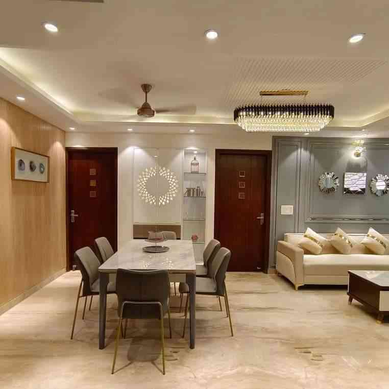 Contemporary 6-Seater Dining Room Design With Wall Trims And Lights