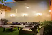 Elegant Outdoor Lounge with Warm Lighting