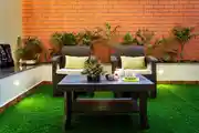 Cozy Outdoor Seating with Lush Greenery