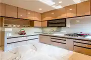 Modern Modular Kitchen with Glossy Cabinets and Marble Flooring