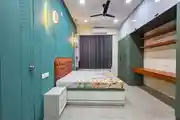 Modern Bedroom with Sleek Storage, A Vibrant Accent Wall