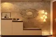 Sophisticated And Modern Foyer Design With Luxurious Gold-Accented Mirror