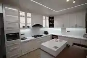 Elegant Modular Kitchen With A Clean White Palette