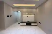 Modern TV Unit Setup With Elegant Marble Flooring