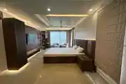 Spacious Modern Bedroom With Warm Wooden Accents