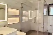 Contemporary Bathroom With Sleek Glass Shower Enclosure