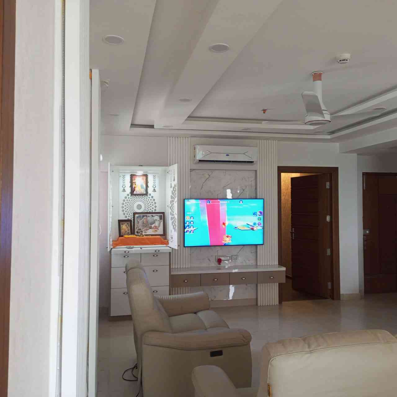 Modern Living Room Featuring A Sleek Wall-Mounted TV