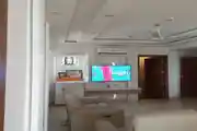 Modern Living Room Featuring A Sleek Wall-Mounted TV