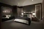 Dark Elegant Bedroom Design With Couch 