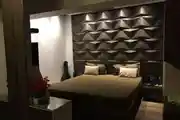 Classic Master Bedroom Design With Black Tufted Headboard